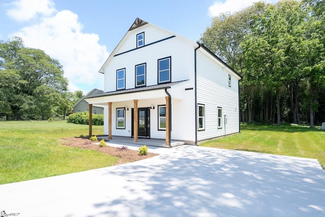 103 Cedar Falls Rd, Fountain Inn, SC 29644 - modern inspired farmhouse with a porch and a front lawn