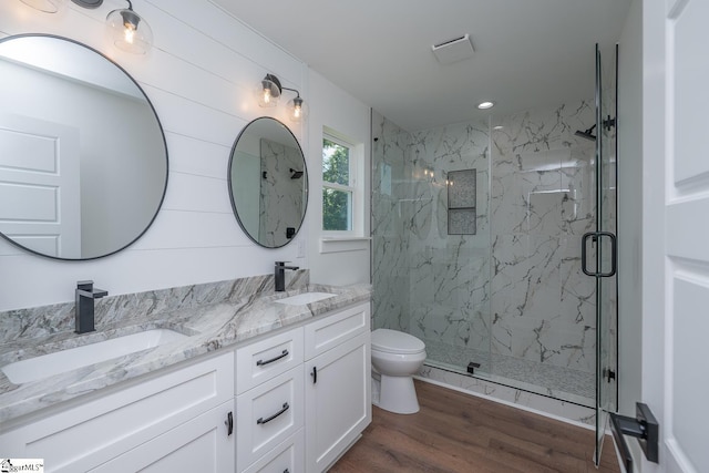 103 Cedar Falls Rd, Fountain Inn, SC 29644 - full bathroom with a marble finish shower, wood finished floors, double vanity, and recessed lighting