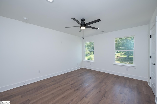 103 Cedar Falls Rd, Fountain Inn, SC 29644 - unfurnished room with dark wood finished floors, a ceiling fan, and a smoke detector