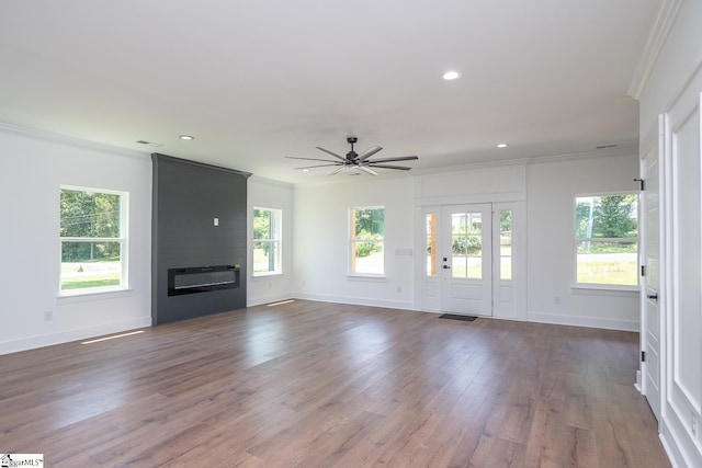 103 Cedar Falls Rd, Fountain Inn, SC 29644 - unfurnished living room with ceiling fan, dark wood finished floors, ornamental molding, a fireplace, and recessed lighting