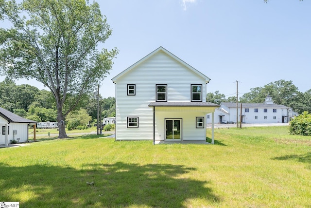 103 Cedar Falls Rd, Fountain Inn, SC 29644 - rear view of house featuring a lawn