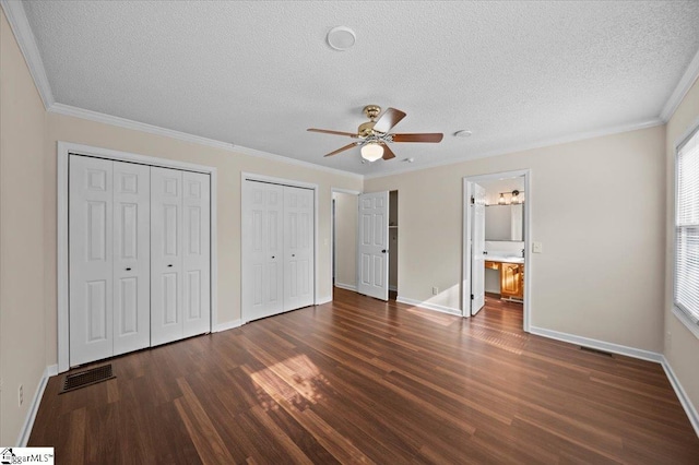 121 Chesterfield Ct, Easley, SC 29640 - unfurnished bedroom with wood finished floors, a textured ceiling, multiple closets, ornamental molding, and a ceiling fan