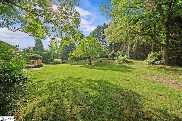 121 Chesterfield Ct, Easley, SC 29640 - view of grassy yard with a wooden deck