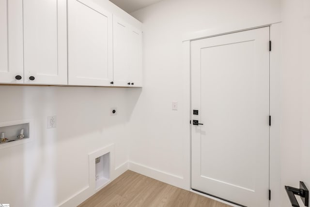 200 Folk Rd, Chesnee, SC 29323 - washroom with cabinet space, hookup for an electric dryer, light wood-style flooring, and hookup for a washing machine