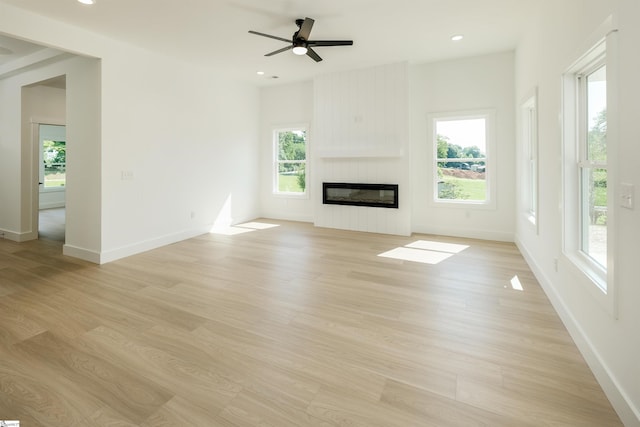 200 Folk Rd, Chesnee, SC 29323 - unfurnished living room featuring light wood finished floors, a fireplace, a ceiling fan, and recessed lighting