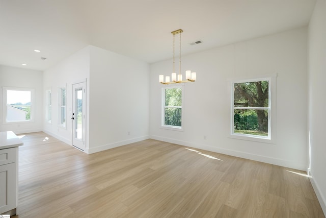 196 Folk Rd, Chesnee, SC 29323 - empty room featuring light wood-style floors, a chandelier, plenty of natural light, and recessed lighting