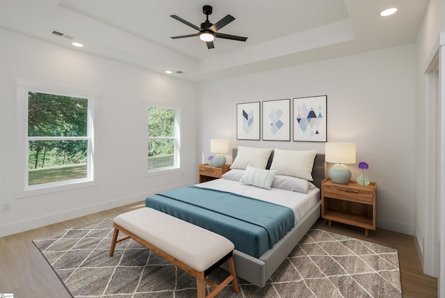 196 Folk Rd, Chesnee, SC 29323 - bedroom with dark wood-type flooring, a raised ceiling, recessed lighting, and ceiling fan