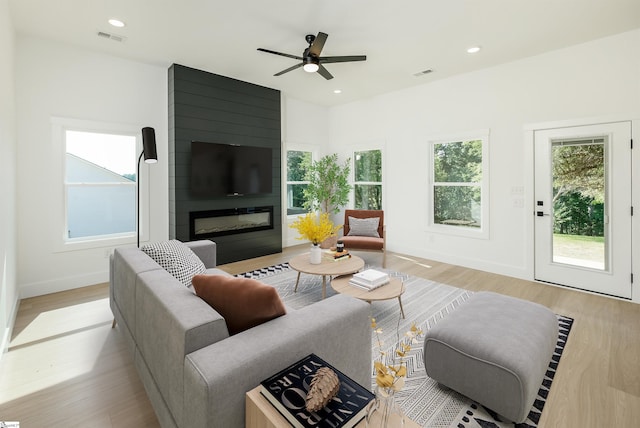 196 Folk Rd, Chesnee, SC 29323 - living room featuring light wood-style flooring, ceiling fan, recessed lighting, and a fireplace