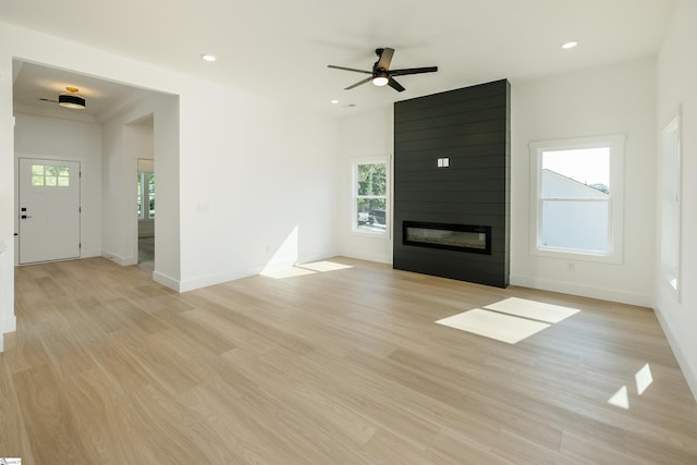 196 Folk Rd, Chesnee, SC 29323 - unfurnished living room featuring a fireplace, light wood-style flooring, plenty of natural light, recessed lighting, and a ceiling fan