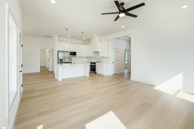 196 Folk Rd, Chesnee, SC 29323 - unfurnished living room featuring a ceiling fan, light wood-style floors, and recessed lighting