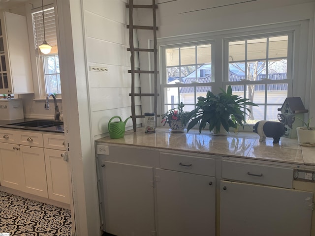 102 Highland Rd, Easley, SC 29640 - kitchen featuring a sink and white cabinets