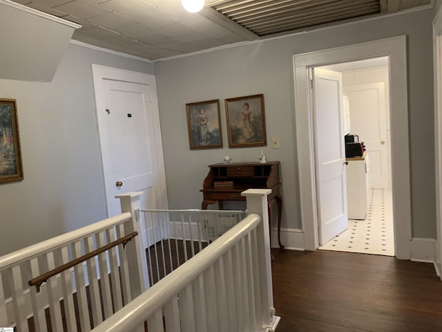 102 Highland Rd, Easley, SC 29640 - hallway with an upstairs landing, dark wood finished floors, and ornamental molding