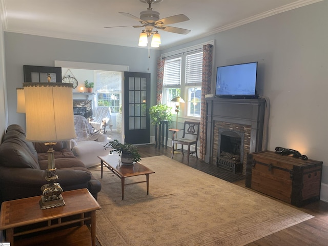 102 Highland Rd, Easley, SC 29640 - living room with wood finished floors, ceiling fan, ornamental molding, and a fireplace with flush hearth