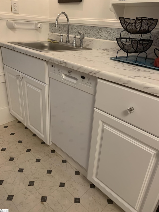 102 Highland Rd, Easley, SC 29640 - kitchen with dishwasher, white cabinetry, and light stone countertops