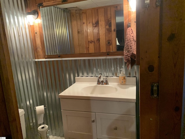 102 Highland Rd, Easley, SC 29640 - bathroom featuring vanity and wooden walls