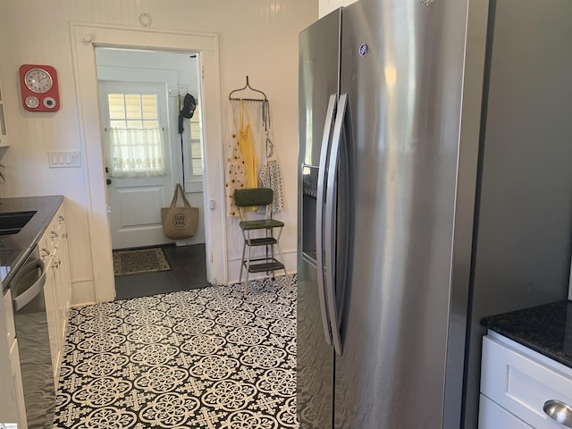 102 Highland Rd, Easley, SC 29640 - kitchen with stainless steel appliances and white cabinetry