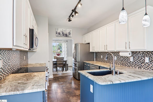 236 Worcester Ln, Easley, SC 29642 - kitchen featuring stainless steel appliances, white cabinetry, light stone counters, and decorative backsplash