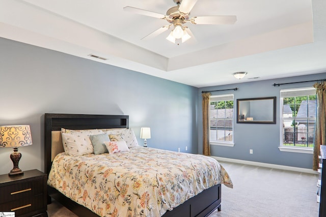 236 Worcester Ln, Easley, SC 29642 - bedroom featuring carpet floors, a ceiling fan, and a raised ceiling