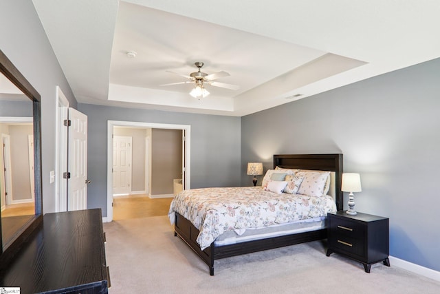 236 Worcester Ln, Easley, SC 29642 - bedroom featuring a raised ceiling, light colored carpet, and a ceiling fan
