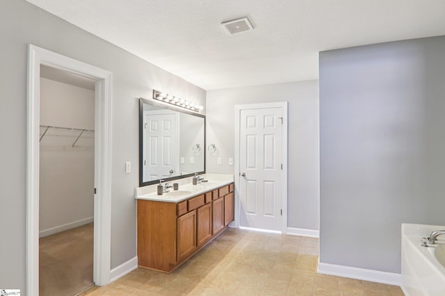 236 Worcester Ln, Easley, SC 29642 - full bath with double vanity, a bath, and a spacious closet
