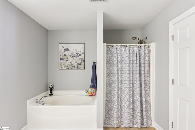 236 Worcester Ln, Easley, SC 29642 - bathroom featuring a bath and a shower with curtain