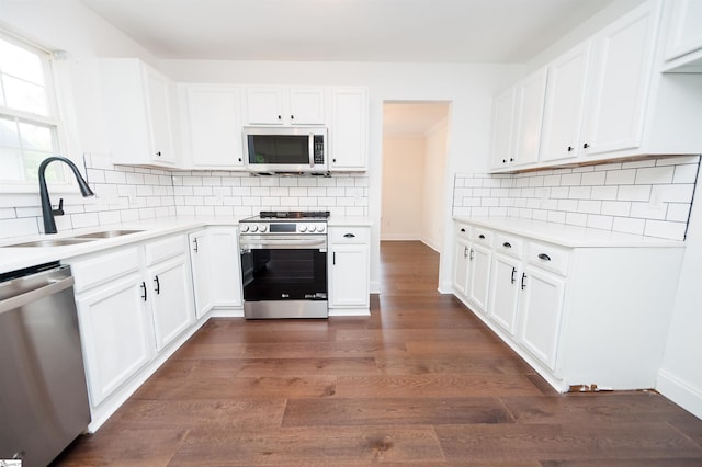 232 Silverbell Dr, Boiling Springs, SC 29316 - kitchen featuring appliances with stainless steel finishes, backsplash, light countertops, and white cabinets