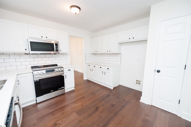 232 Silverbell Dr, Boiling Springs, SC 29316 - kitchen featuring stainless steel appliances, white cabinets, decorative backsplash, and light countertops