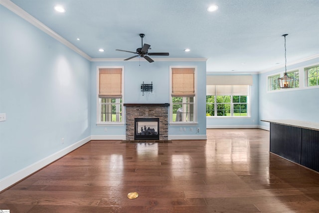 113 River Pines Trl, Greer, SC 29651 - unfurnished living room featuring crown molding, a fireplace, recessed lighting, ceiling fan, and wood finished floors