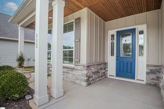 113 River Pines Trl, Greer, SC 29651 - doorway to property with a porch, board and batten siding, and stone siding