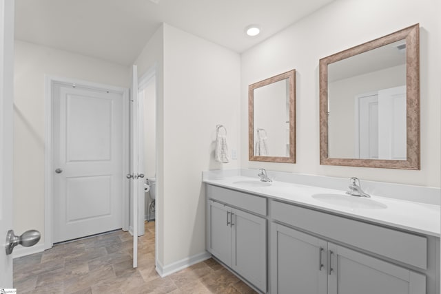 220 Emerald Creek Ave, Greer, SC 29651 - full bathroom featuring double vanity and stone finish floors