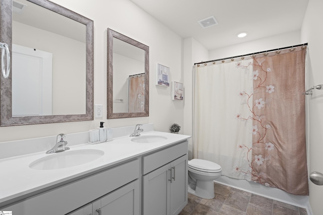 220 Emerald Creek Ave, Greer, SC 29651 - full bath with double vanity, shower / bathtub combination with curtain, recessed lighting, and stone finish floors