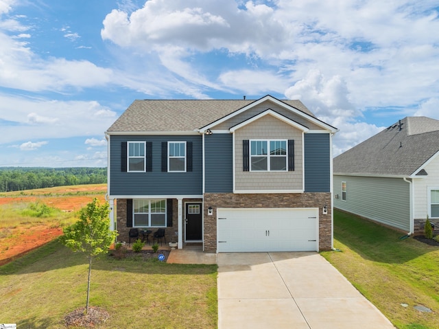 220 Emerald Creek Ave, Greer, SC 29651 - craftsman-style home featuring a garage, a front lawn, and stone siding