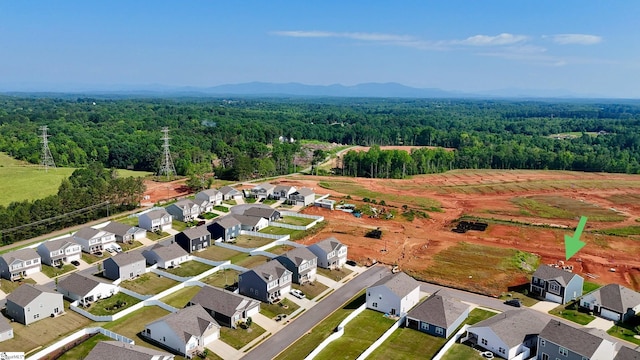 220 Emerald Creek Ave, Greer, SC 29651 - aerial perspective of suburban area with a forest