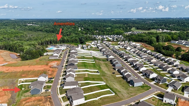 220 Emerald Creek Ave, Greer, SC 29651 - aerial overview of property's location with a heavily wooded area and nearby suburban area