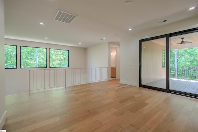 454 Enoree Rd, Travelers Rest, SC 29690 - empty room with light wood-style flooring and recessed lighting