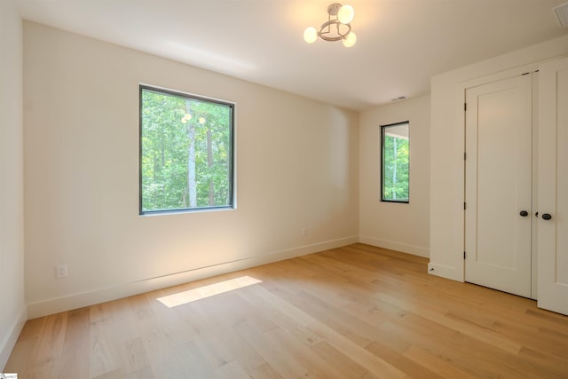 454 Enoree Rd, Travelers Rest, SC 29690 - unfurnished bedroom featuring light wood-type flooring and baseboards