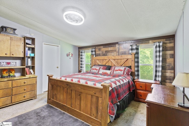 419-425 Chesapeake Trl, Pickens, SC 29671 - bedroom featuring wood walls, light colored carpet, lofted ceiling, and a textured ceiling
