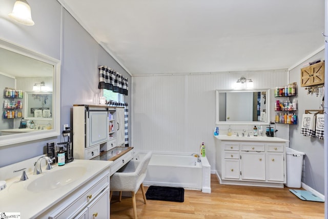 419-425 Chesapeake Trl, Pickens, SC 29671 - full bathroom with wood finished floors, two vanities, and a bath