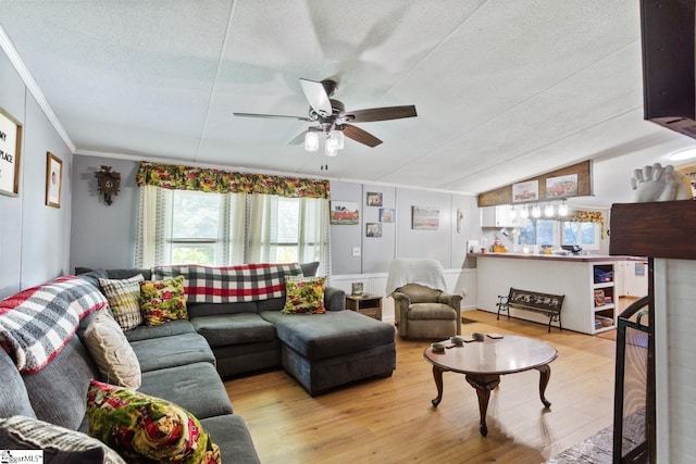 419-425 Chesapeake Trl, Pickens, SC 29671 - living room featuring healthy amount of natural light, a ceiling fan, a textured ceiling, ornamental molding, and wood finished floors