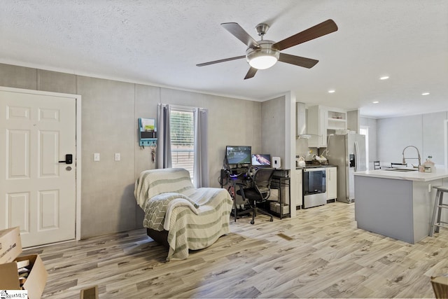 419-425 Chesapeake Trl, Pickens, SC 29671 - living room featuring light wood-type flooring, an office area, a ceiling fan, and recessed lighting