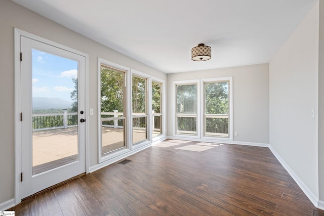 600 Packs Mountain Ridge Rd, Taylors, SC 29687 - unfurnished sunroom with plenty of natural light and wood finished floors
