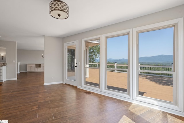 600 Packs Mountain Ridge Rd, Taylors, SC 29687 - spare room featuring a mountain view and dark wood-style flooring