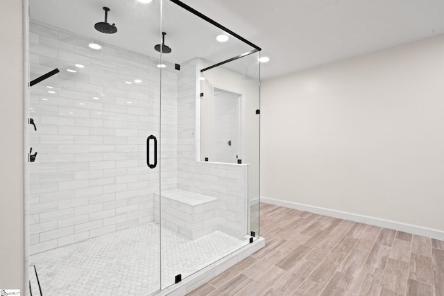 600 Packs Mountain Ridge Rd, Taylors, SC 29687 - bathroom featuring a stall shower, wood finished floors, and recessed lighting