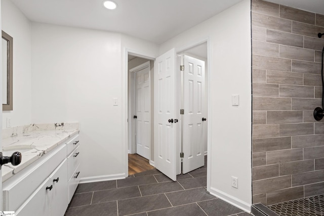 600 Packs Mountain Ridge Rd, Taylors, SC 29687 - bathroom with a tile shower, vanity, tile patterned floors, and recessed lighting