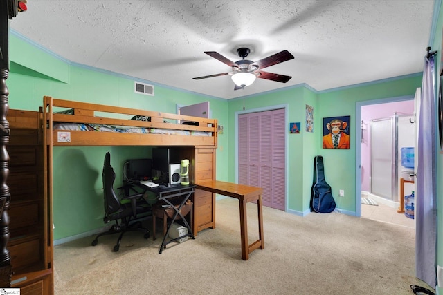 5 Nova St, Taylors, SC 29687 - carpeted bedroom featuring a textured ceiling, a desk, a closet, ceiling fan, and crown molding