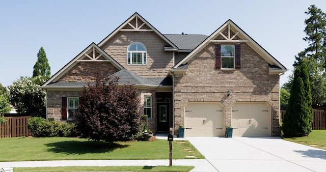 215 Wando Way, Greer, SC 29650 - craftsman-style home featuring driveway, a garage, brick siding, and roof with shingles