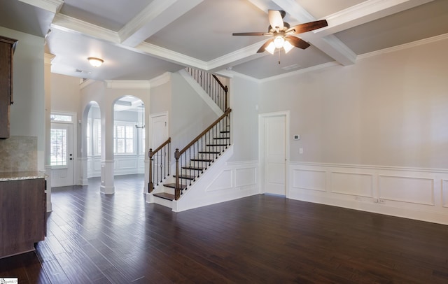 215 Wando Way, Greer, SC 29650 - entrance foyer with arched walkways, beamed ceiling, ceiling fan, stairs, and dark wood-style flooring