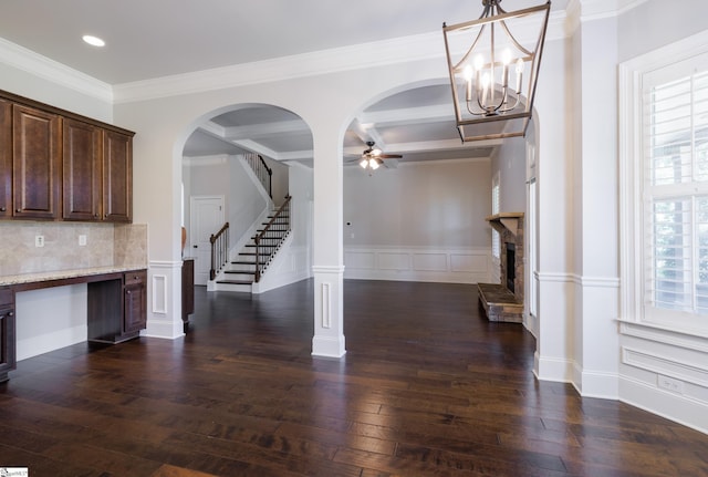 215 Wando Way, Greer, SC 29650 - unfurnished dining area with a ceiling fan, a fireplace, recessed lighting, stairs, and coffered ceiling