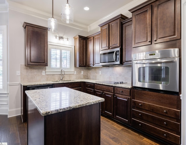 215 Wando Way, Greer, SC 29650 - kitchen featuring stainless steel appliances, a center island, dark brown cabinetry, dark wood-style flooring, and crown molding