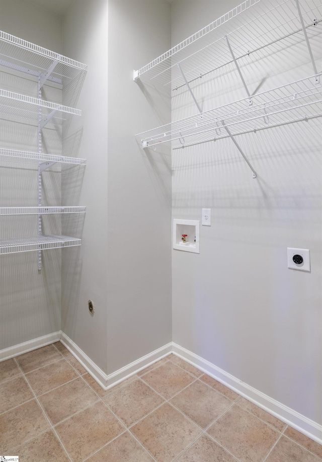 215 Wando Way, Greer, SC 29650 - laundry room featuring electric dryer hookup, washer hookup, and tile patterned floors